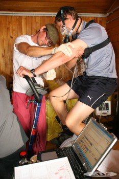 Oli Burdell carries out a CPEX test while Ned Gilter takes blood from him